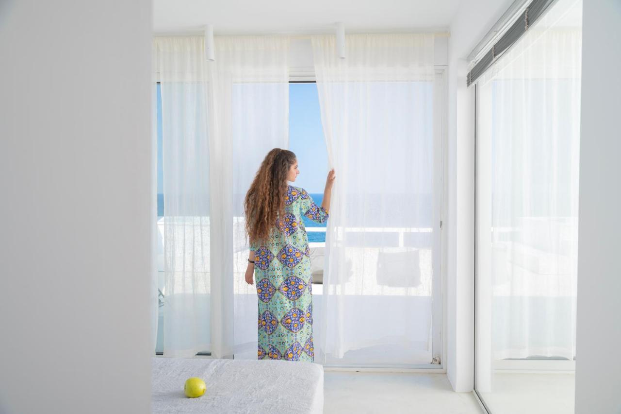 Infinite Blue Luxury Suites Тира Экстерьер фото