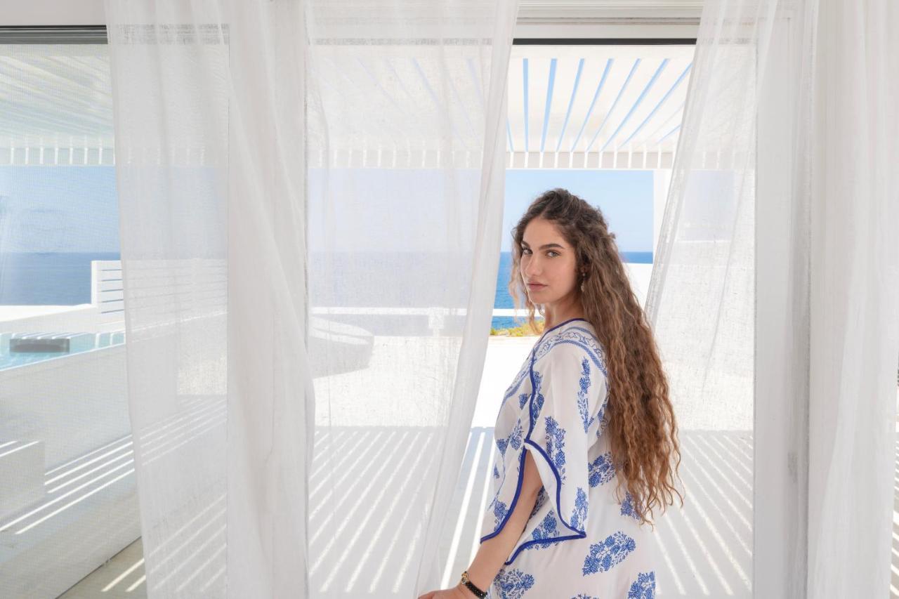 Infinite Blue Luxury Suites Тира Экстерьер фото